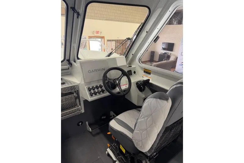 Slide: The Image of Interior of 2026 Duckworth 26 Pacific Pro boat with Garmin navigation system. - 25