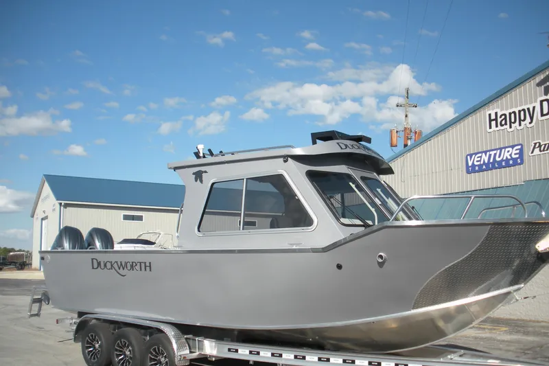 Slide: The Image of 2026 Duckworth 26 Pacific Pro boat on trailer under clear sky. - 4