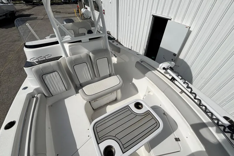 Slide: The Image of 2021 Sea Fox 249 Avenger boat interior with seating and table setup. - 13