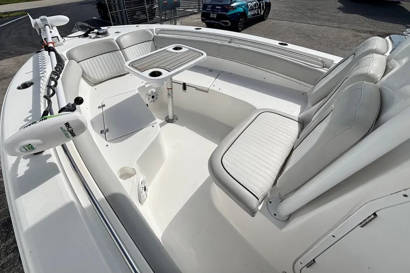 Slide: The Image of 2021 Sea Fox 249 Avenger boat interior with seating and table setup. - 17