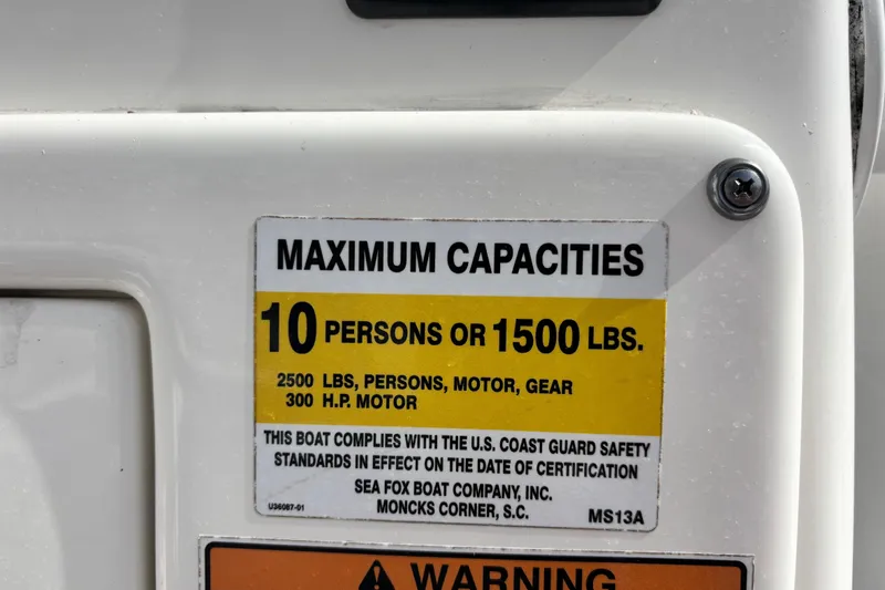 Slide: The Image of 2021 Sea Fox 249 Avenger capacity label: 10 persons or 1500 lbs, 300 HP motor. - 21