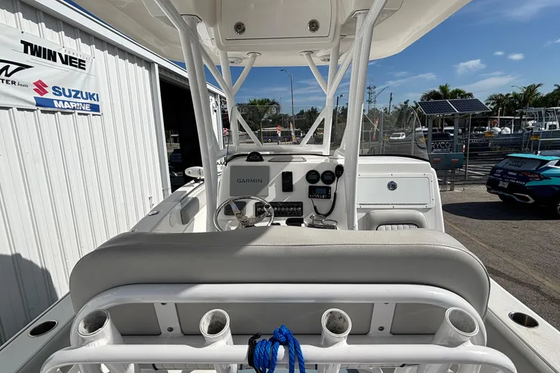 Slide: The Image of 2021 Sea Fox 249 Avenger boat interior with Garmin navigation system and rod holders. - 24