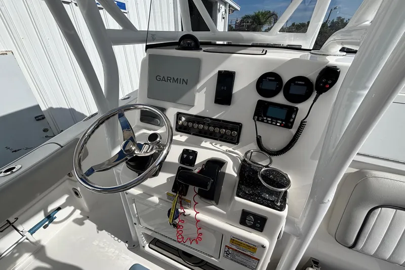 Slide: The Image of 2021 Sea Fox 249 Avenger boat console with Garmin navigation and control panel. - 28