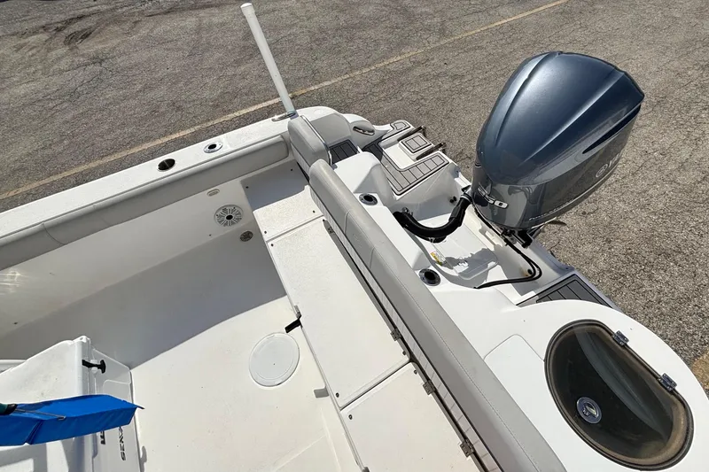 Slide: The Image of 2021 Sea Fox 249 Avenger boat with Yamaha outboard motor, spacious deck, and fishing amenities. - 33