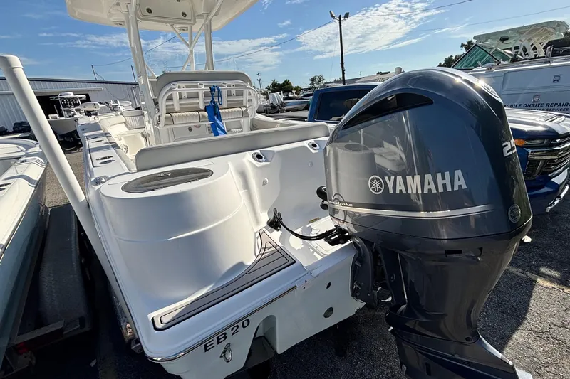 Slide: The Image of 2021 Sea Fox 249 Avenger boat with Yamaha outboard motor, parked outdoors. - 35