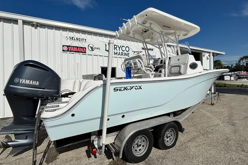 Slide: The Image of 2021 Sea Fox 249 Avenger boat on trailer, featuring Yamaha outboard motor. - 5