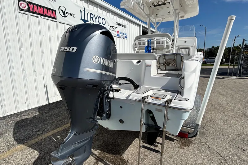Slide: The Image of 2021 Sea Fox 249 Avenger boat with Yamaha 250 engine, parked outdoors. - 7