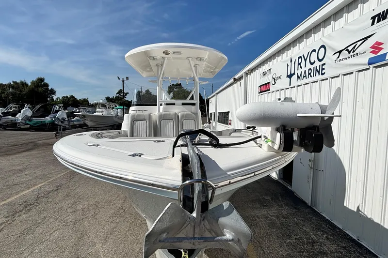 Slide: The Image of 2021 Sea Fox 249 Avenger boat at Ryco Marine dealership, sunny day. - 8