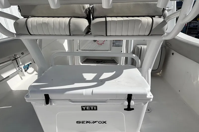 Slide: The Image of 2021 Sea Fox 249 Avenger boat interior with Yeti cooler and seating. - 9