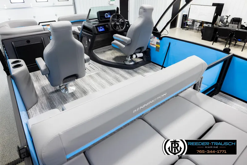 Slide: The Image of 2026 Bennington 22 MSBSE boat interior with modern seating and control panel. - 11