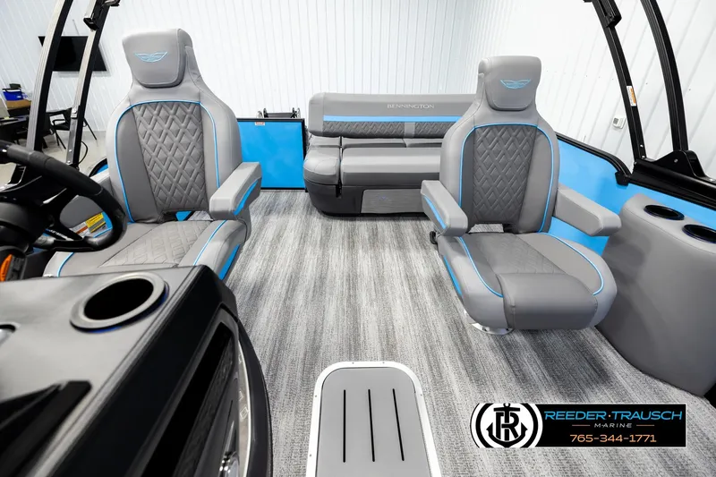 Slide: The Image of Interior of 2026 Bennington 22 MSBSE pontoon boat with gray and blue seating. - 14