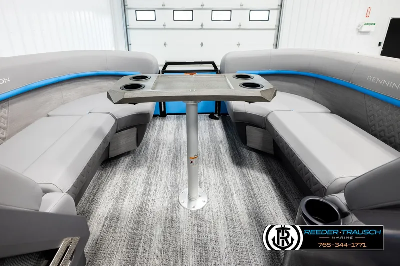 Slide: The Image of Interior of 2026 Bennington 22 MSBSE pontoon boat with gray seating and table. - 19