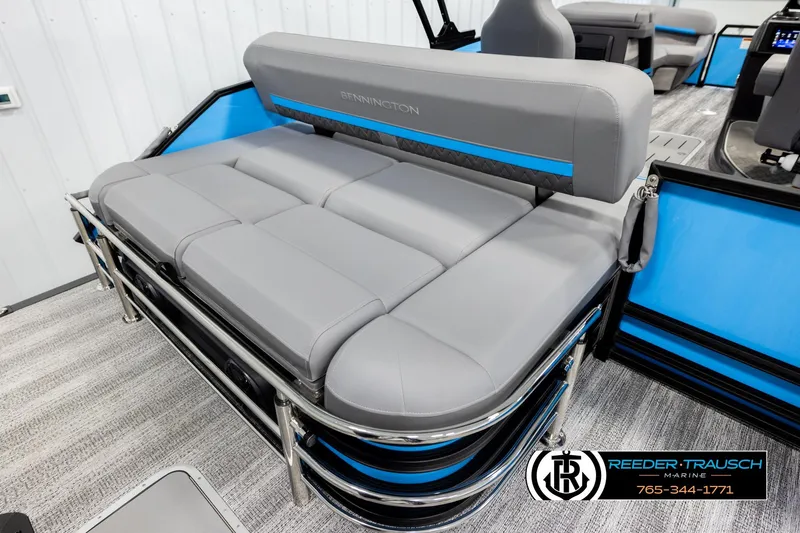 Slide: The Image of 2026 Bennington 22 MSBSE pontoon boat with gray seating and blue accents. - 22