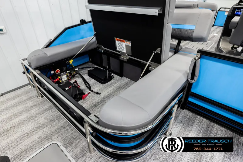 Slide: The Image of 2026 Bennington 22 MSBSE pontoon boat interior with seating and storage compartments. - 26