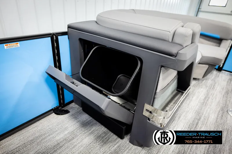 Slide: The Image of 2026 Bennington 22 MSBSE boat interior with storage compartment and seating. - 28