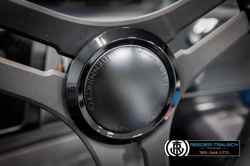 Slide: The Image of Close-up of 2026 Bennington 22 MSBSE steering wheel with Reeder-Trausch Marine logo. - 31