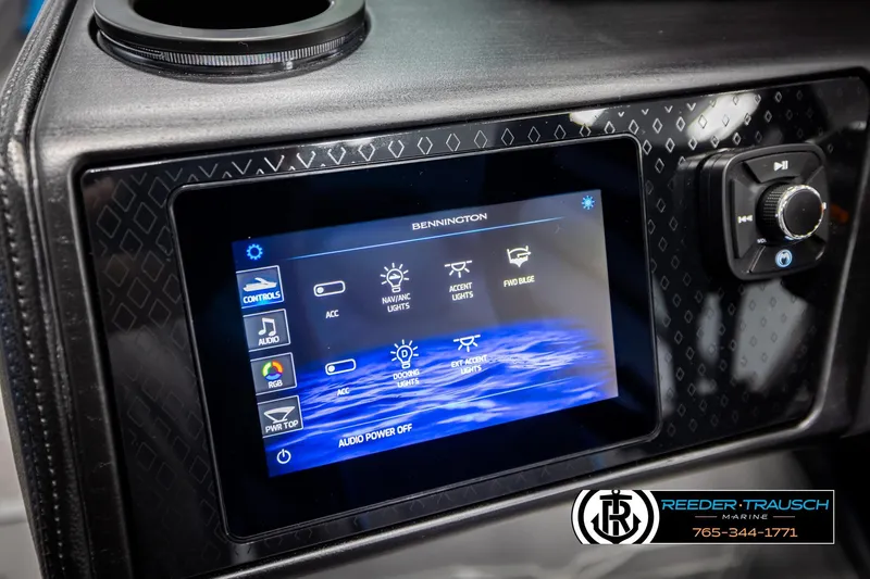 Slide: The Image of 2026 Bennington 22 MSBSE boat dashboard with touchscreen controls and audio system. - 33