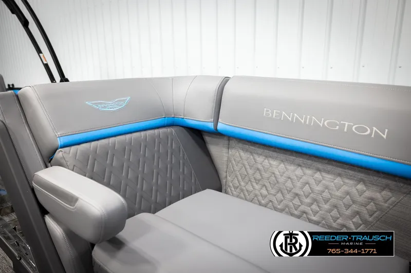 Slide: The Image of 2026 Bennington 22 MSBSE boat seating with gray upholstery and blue accents. - 41