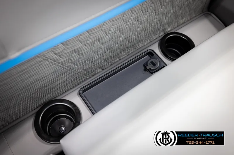 Slide: The Image of Interior of 2026 Bennington 22 MSBSE boat with cup holders and USB port. - 42