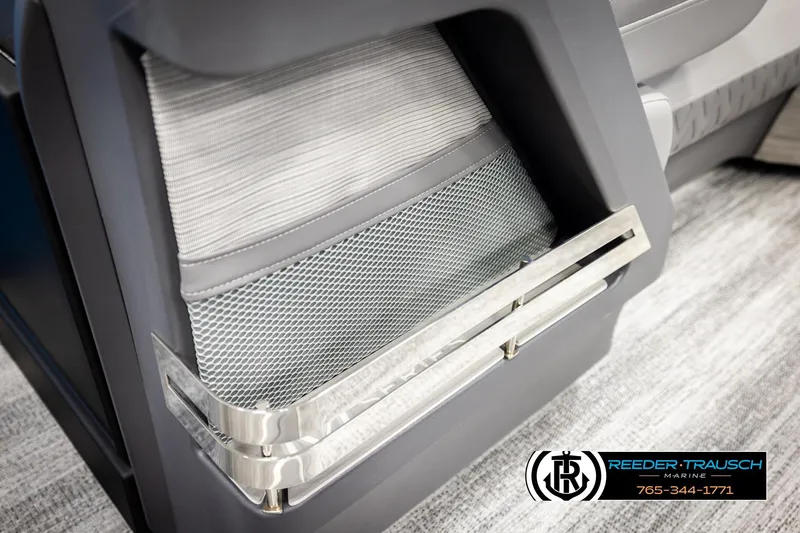 Slide: The Image of 2026 Bennington 22 MSBSE boat interior detail with storage compartment and sleek design. - 43
