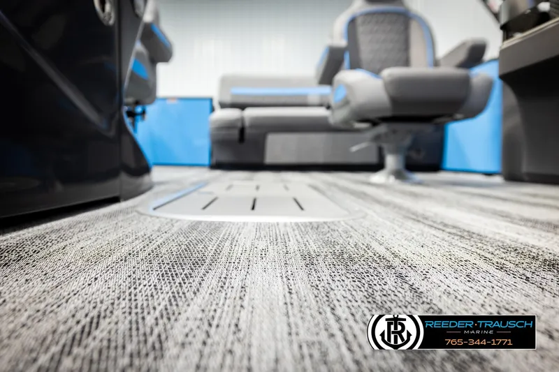 Slide: The Image of Interior of 2026 Bennington 22 MSBSE boat with modern seating and textured flooring. - 46