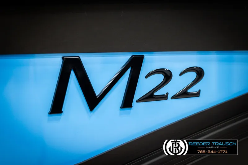 Slide: The Image of 2026 Bennington 22 MSBSE boat logo with blue background and Reeder-Trausch Marine branding. - 49
