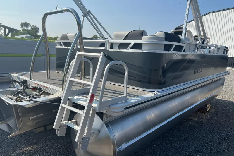 Slide: The Image of Captain's chair in 2026 Tahoe Pontoon QUAD LOUNGE 1980, featuring sleek design and comfort. - 4