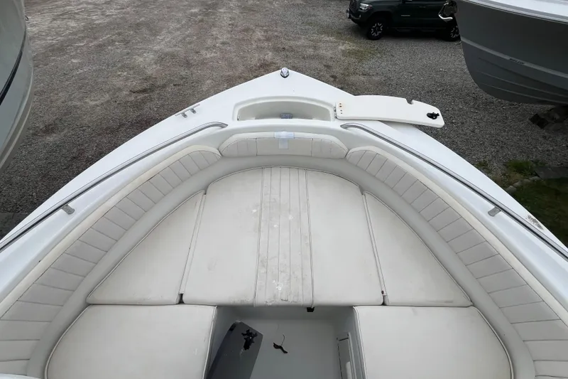 Slide: The Image of 2002 Hydra-Sports 202 DC boat with spacious white seating area and open deck. - 8