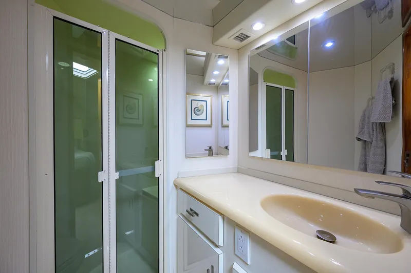 Slide: The Image of Luxurious bathroom in 1998 Viking 53 Convertible yacht with modern fixtures and shower. - 37