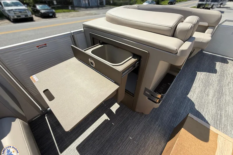 Slide: The Image of 2025 Bennington 22ML boat interior with pull-out storage and seating. - 9