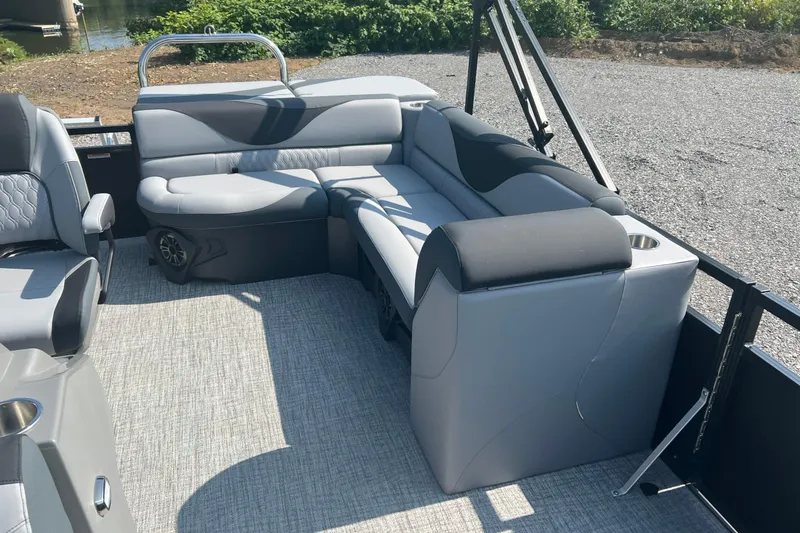 Slide: The Image of 2026 Tahoe Pontoon 1980 CRUISE interior with gray seating and cup holders. - 11