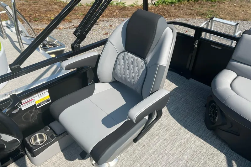 Slide: The Image of 2026 Tahoe Pontoon 1980 CRUISE captain's chair with sleek design and comfortable seating. - 18