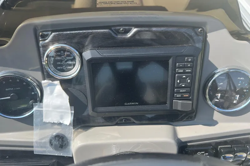 Slide: The Image of Dashboard of 2026 Tahoe Pontoon 1980 CRUISE with Garmin display and gauges. - 19