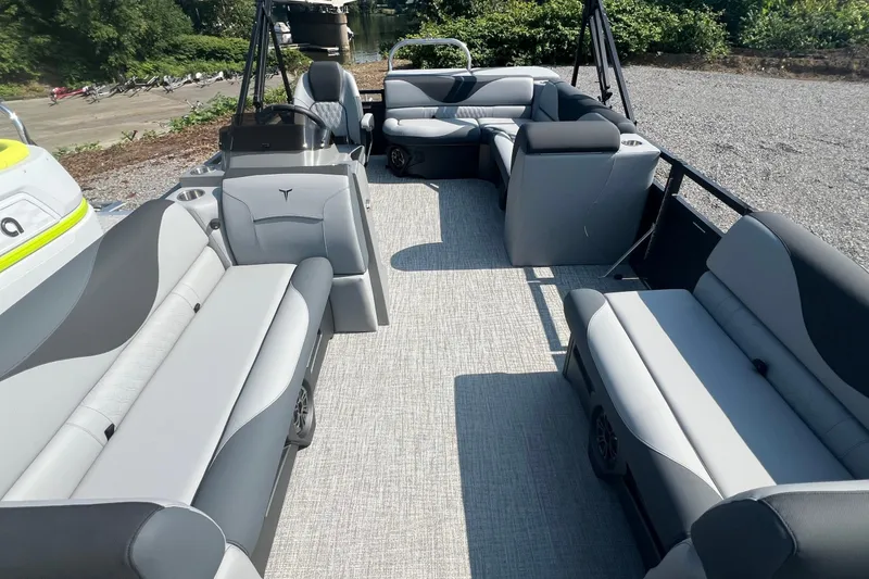 Slide: The Image of 2026 Tahoe Pontoon 1980 CRUISE interior with gray seating and open layout. - 8
