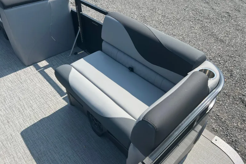 Slide: The Image of 2026 Tahoe Pontoon 1980 CRUISE boat seat with gray upholstery and cup holder. - 9