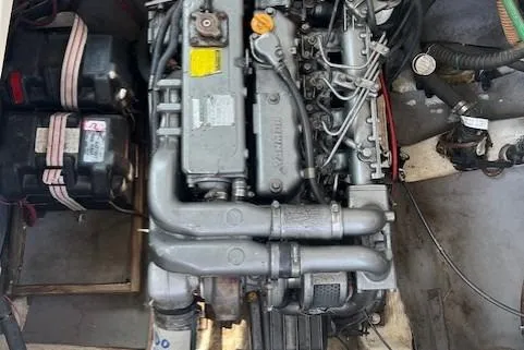 Slide: The Image of 1985 Albin 27 Family engine compartment with visible components and wiring. - 4