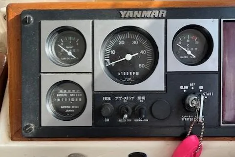 Slide: The Image of Control panel of a 1985 Albin 27 Family boat with Yanmar engine gauges. - 9