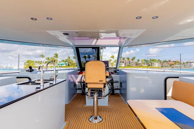 Slide: The Image of Luxurious 2018 Gunboat 57 yacht interior with modern helm and panoramic ocean views. - 17