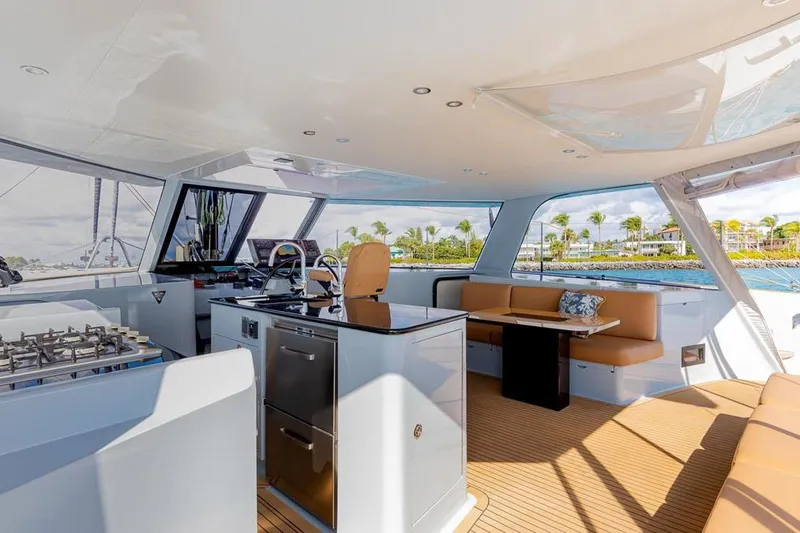 Slide: The Image of Luxurious interior of 2018 Gunboat 57 yacht with modern kitchen and seating area. - 26