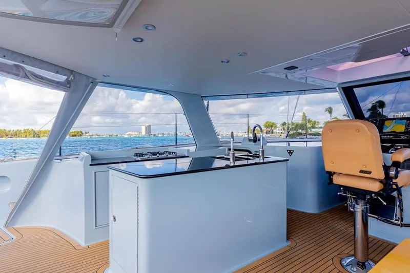 Slide: The Image of Luxurious 2018 Gunboat 57 yacht interior with modern helm and ocean view. - 27