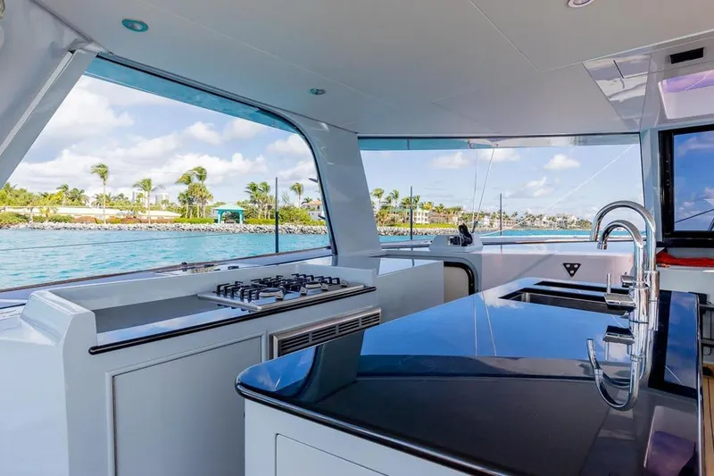 Slide: The Image of Luxurious 2018 Gunboat 57 yacht interior with modern kitchen and ocean view. - 28