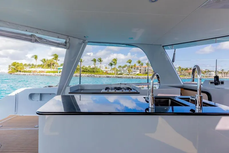 Slide: The Image of Luxurious 2018 Gunboat 57 yacht interior with modern kitchen and ocean view. - 33