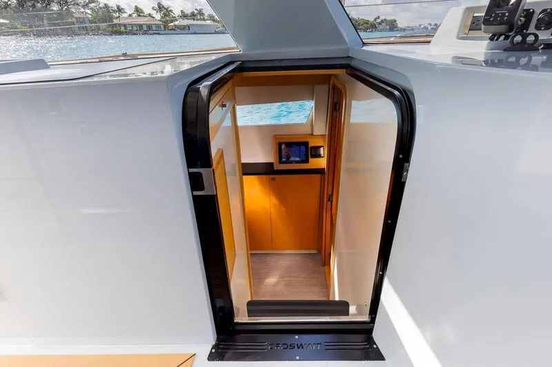 Slide: The Image of Entrance to 2018 Gunboat 57 yacht interior, featuring sleek design and modern amenities. - 34