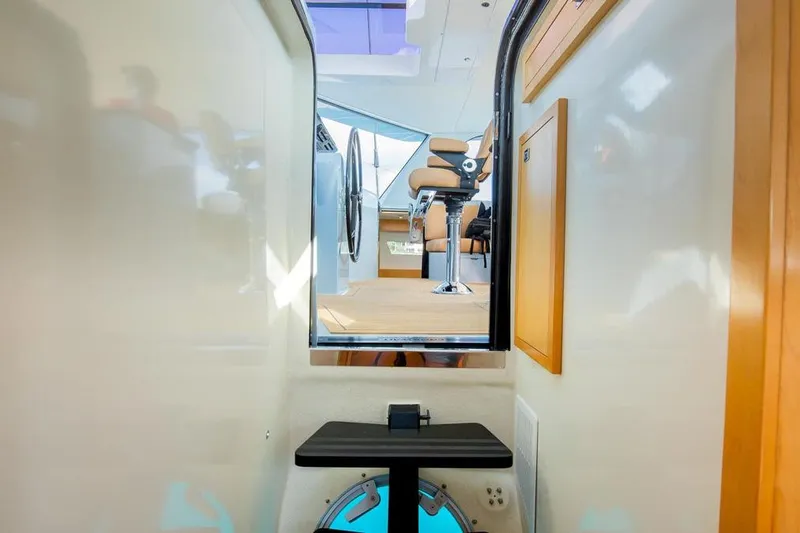Slide: The Image of Interior view of 2018 Gunboat 57 yacht, showcasing sleek design and modern seating. - 35