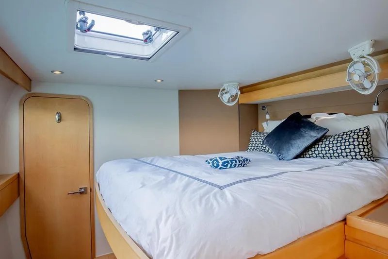 Slide: The Image of Luxurious bedroom interior of 2018 Gunboat 57 yacht with skylight and modern decor. - 37