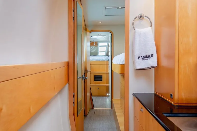 Slide: The Image of Luxurious interior of 2018 Gunboat 57 yacht, featuring sleek wood finishes and modern design. - 40