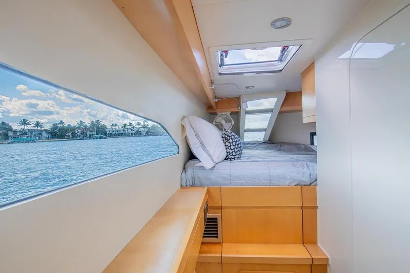 Slide: The Image of Interior of 2018 Gunboat 57 yacht cabin with bed and ocean view. - 43
