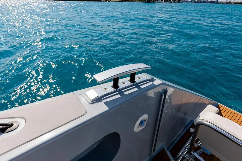 Slide: The Image of 2018 Gunboat 57 yacht deck with ocean view and sleek design elements. - 52