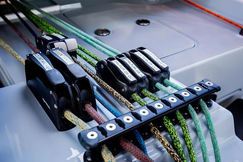 Slide: The Image of Close-up of colorful ropes and clutches on a 2018 Gunboat 57 sailboat. - 54