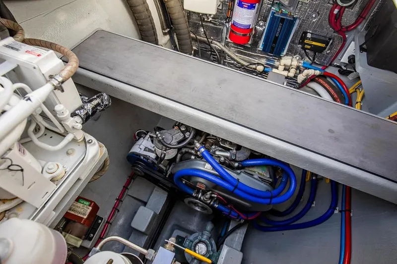 Slide: The Image of Engine room of 2018 Gunboat 57 yacht, featuring complex wiring and machinery. - 59